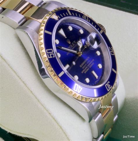 review 16613 rolex submariner stainless steel goind blue|rolex 16613 price guide.